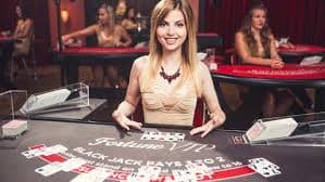Live dealer spinning Lightning Roulette wheel with multiplier display